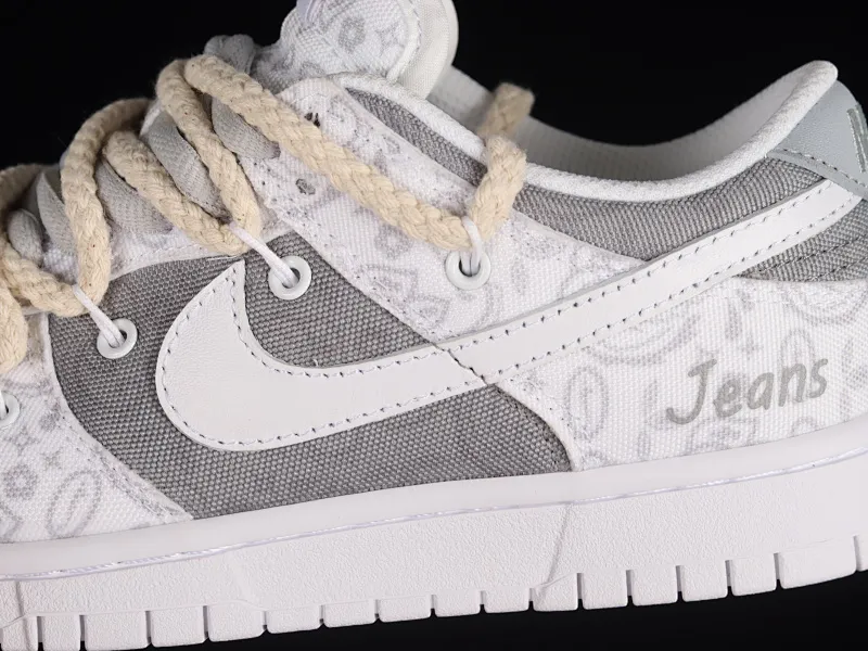 All categories Nk SB Dunk series Nk SB Dunk Low low-top sneakers Nk Dunk Low ESS reverse cashew flower customized version of deconstructed strap casual sneakers DJ9955-100